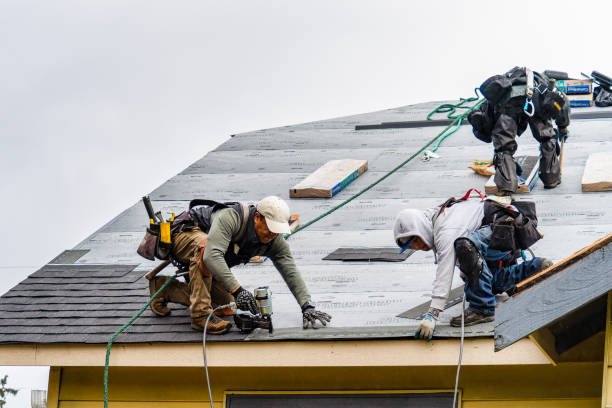 Professional Gutter Installation technician working in Batavia, IA